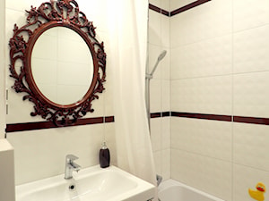 Mała łazienka, białe płytki, czerwone akcenty - zdjęcie od Trykowska Studio
