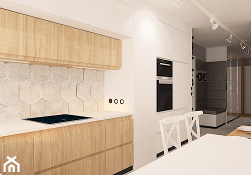 Mieszkanie na Suwalskiej - Duża otwarta z kamiennym blatem biała szara z zabudowaną lodówką kuchnia w kształcie litery u, styl skandynawski - zdjęcie od Pracownia Projektowa "Interior-Art"