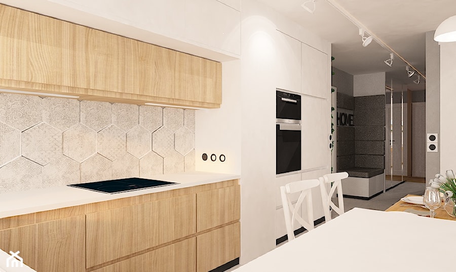 Mieszkanie na Suwalskiej - Duża otwarta z kamiennym blatem biała szara z zabudowaną lodówką kuchnia w kształcie litery u, styl skandynawski - zdjęcie od Pracownia Projektowa "Interior-Art"