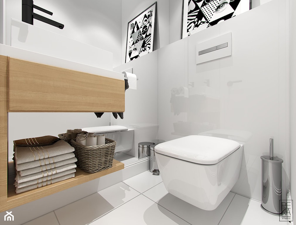 biała nowoczesna łazienka z połyskującymi płytkami