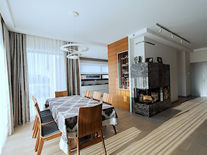 Duża szara jadalnia jako osobne pomieszczenie, styl nowoczesny - zdjęcie od STUDIO ROGACKI