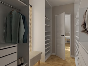 Sypialnia z garderobą na poddaszu w odcieniach taupe - Garderoba, styl skandynawski - zdjęcie od KJ Studio Projektowanie wnętrz