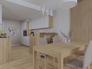 Salon z kuchnią i wydzielonym miejscem na domową biblioteczkę - Jadalnia, styl nowoczesny - zdjęcie od KJ Studio Projektowanie wnętrz