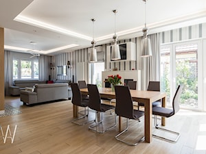 Ponadczasowa elegancja - Średni szary salon z jadalnią z tarasem / balkonem, styl nowoczesny - zdjęcie od AAW studio