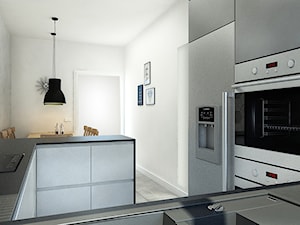Cementowy patchwork - Średnia otwarta z salonem biała z zabudowaną lodówką z nablatowym zlewozmywakiem kuchnia w kształcie litery g, styl nowoczesny - zdjęcie od WNĘTRZOMANIA