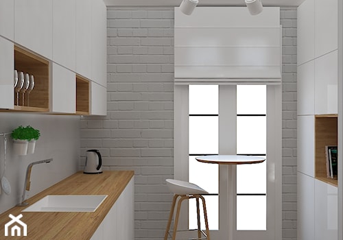 Mieszkanie w ciepłym skandynawskim stylu - Średnia zamknięta szara z zabudowaną lodówką z lodówką wolnostojącą z nablatowym zlewozmywakiem kuchnia dwurzędowa z oknem, styl skandynawski - zdjęcie od Design Factory Studio Projektowe