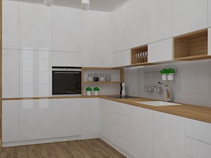 Mieszkanie w ciepłym skandynawskim stylu - Duża otwarta z salonem kuchnia w kształcie litery l, styl skandynawski - zdjęcie od Design Factory Studio Projektowe