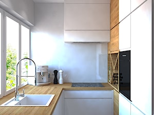 Trzy pokoje na Teofilowie - Mała zamknięta biała z zabudowaną lodówką z podblatowym zlewozmywakiem kuchnia w kształcie litery u z oknem, styl skandynawski - zdjęcie od Design Factory Studio Projektowe