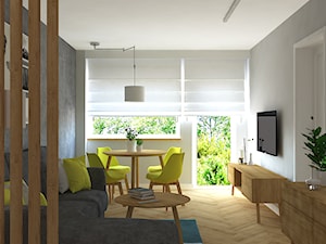 Trzy pokoje na Teofilowie - Średni szary salon z jadalnią z tarasem / balkonem, styl skandynawski - zdjęcie od Design Factory Studio Projektowe