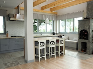Dom pod Skulskiem - Duża otwarta biała kuchnia w kształcie litery l z wyspą lub półwyspem, styl skandynawski - zdjęcie od DeGosh