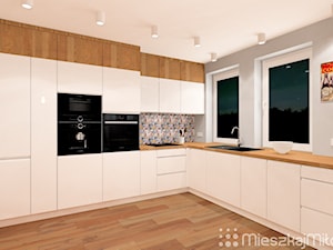 Aranżacja salonu z aneksem kuchennym - zdjęcie od Pracownia Projektowania Wnętrz "Mieszkaj Miło"