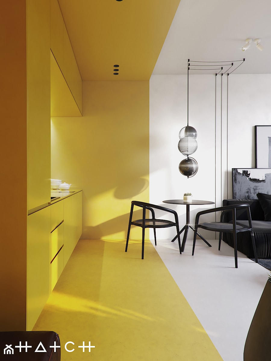PROJEKT KAWALERKI - WARSZAWA MURANÓW - Średnia z żółtymi frontami otwarta z salonem z kamiennym blatem szara żółta z zabudowaną lodówką z nablatowym zlewozmywakiem kuchnia jednorzędowa, styl minimalistyczny - zdjęcie od HATCH STUDIO