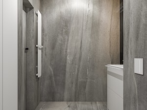 PROJEKT MIESZKANIA - WARSZAWA ŚRÓDMIEŚCIE - Mała bez okna z marmurową podłogą łazienka, styl minimalistyczny - zdjęcie od HATCH STUDIO