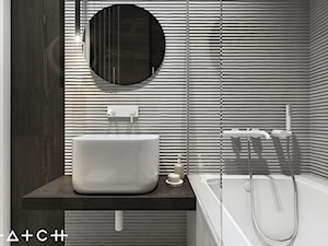 PROJEKT APARTAMENTU - WARSZAWA MARYMONT - Mała na poddaszu bez okna z lustrem łazienka, styl nowoczesny - zdjęcie od HATCH STUDIO