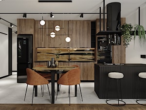 Kontrastowy salon z otwartą kuchnią w eleganckim wydaniu - zdjęcie od Olga Ostrowska