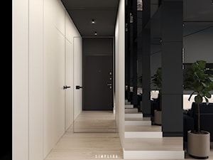 MĘSKA "JASKINIA" - Średni biały czarny hol / przedpokój, styl minimalistyczny - zdjęcie od SIMPLIKA