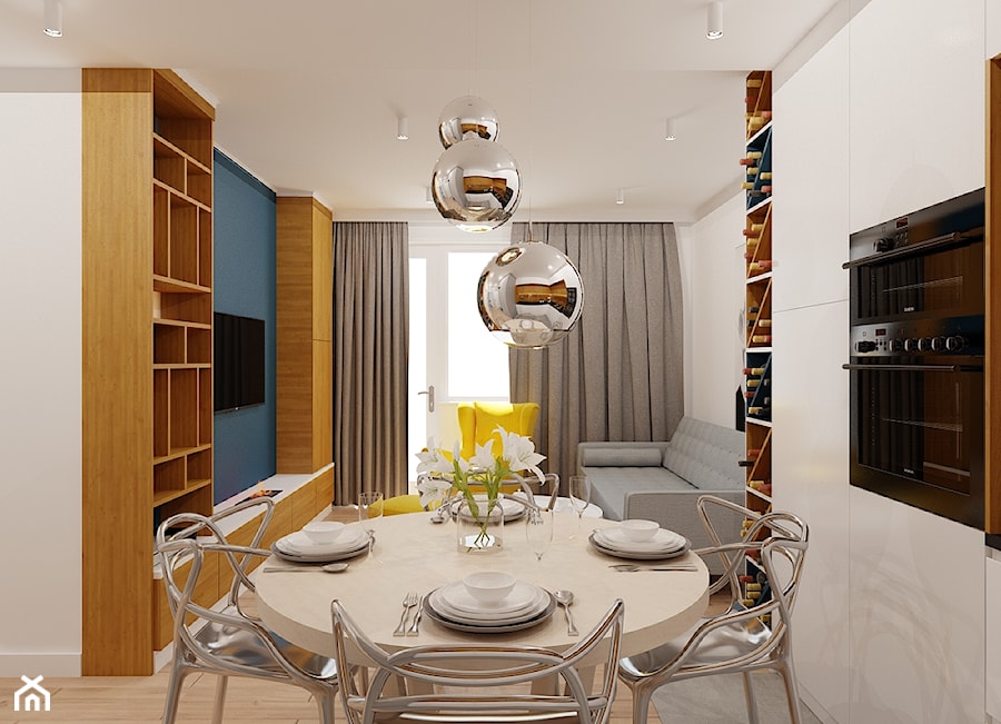 40 m² w Warszawie - Średnia niebieska szara jadalnia w salonie w kuchni - zdjęcie od Piec Piąty