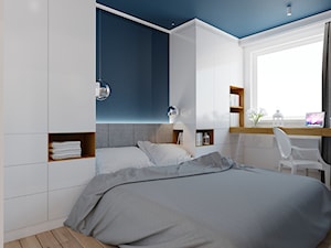 40 m² w Warszawie - Mała niebieska z biurkiem sypialnia - zdjęcie od Piec Piąty