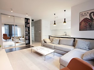 DEER - Duży biały salon z kuchnią, styl nowoczesny - zdjęcie od Bogaczewicz Architecture Studio
