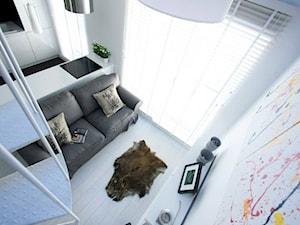 29 m2 - Mały biały salon z kuchnią, styl nowoczesny - zdjęcie od Bogaczewicz Architecture Studio