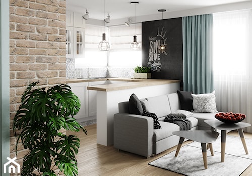 Mieszkanie w Legnicy - Mały czarny szary salon z kuchnią z jadalnią, styl skandynawski - zdjęcie od Pracownia WAŻKA