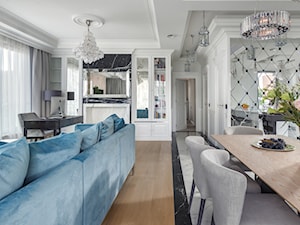 Apartament Gdynia Nowe Orłowo - Duży biały salon z kuchnią z jadalnią z bibiloteczką - zdjęcie od Arte Dizain