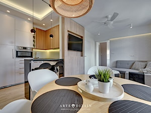 Mieszkanie na wynajem - Sopot - Duży biały salon z kuchnią z jadalnią, styl nowoczesny - zdjęcie od Arte Dizain
