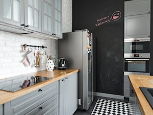Eklektyczny Pruszków - Średnia otwarta biała czarna z zabudowaną lodówką z lodówką wolnostojącą kuchnia, styl nowoczesny - zdjęcie od EG projekt