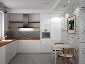 Kuchnia skandynawska - metamorfoza - Średnia otwarta z salonem biała z zabudowaną lodówką kuchnia w kształcie litery l, styl skandynawski - zdjęcie od Icona Studio