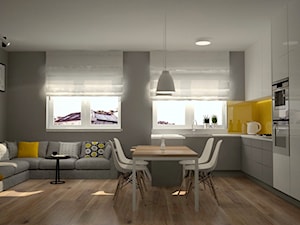 Mieszkanie na Ursynowie - Średnia otwarta z salonem z kamiennym blatem szara żółta z zabudowaną lodówką kuchnia w kształcie litery l z wyspą lub półwyspem, styl skandynawski - zdjęcie od Icona Studio