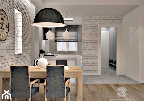 Segment w warszawie - Średnia biała jadalnia jako osobne pomieszczenie - zdjęcie od Icona Studio