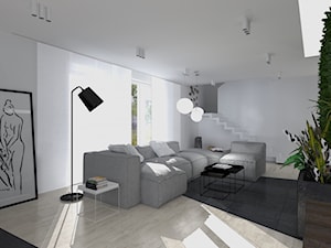 Minimalistyczny salon - zdjęcie od Kadoka Architekci