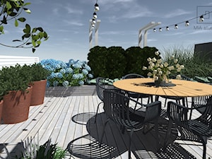 Taras na dachu - Duży z meblami ogrodowymi z donicami na kwiaty taras na dachu, styl nowoczesny - zdjęcie od MIA studio