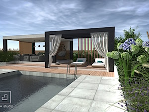 Ogród z basenem - Duży ogród za domem z altaną z basenem, styl nowoczesny - zdjęcie od MIA studio