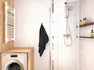 Projekt mieszkania w Tarnowie - Mała bez okna z pralką / suszarką z punktowym oświetleniem łazienka, styl nowoczesny - zdjęcie od jedna.pani.s