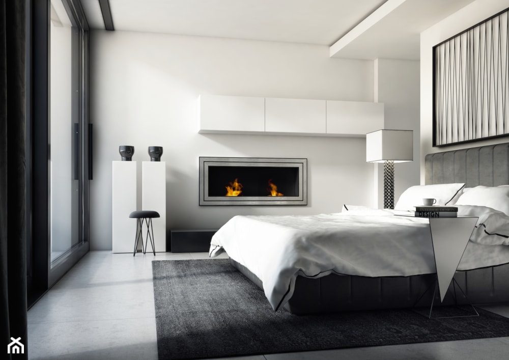 sypialnia w stylu nowoczesnym z biokominkiem, szary dywan, lampa podłogowa z białym abażurem