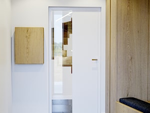 Przytulne wnętrze - Mały biały z marmurem na podłodze hol / przedpokój, styl nowoczesny - zdjęcie od NUKO STUDIO