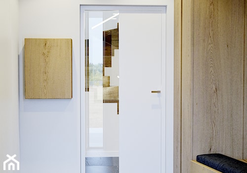 Przytulne wnętrze - Mały biały z marmurem na podłodze hol / przedpokój, styl nowoczesny - zdjęcie od NUKO STUDIO