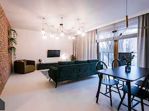 Mieszkanie na wynajem Front Park Gdańsk - Średni biały salon z jadalnią z tarasem / balkonem, styl industrialny - zdjęcie od masz design Magdalena Szwedowska