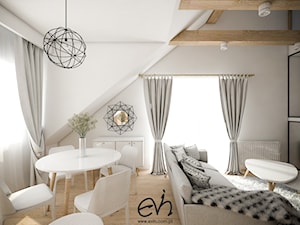 Salon z kuchnią na poddaszu - Biały salon z jadalnią, styl skandynawski - zdjęcie od Evin