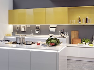 Kuchnie - Z żółtymi frontami kuchnia, styl nowoczesny - zdjęcie od Nolte