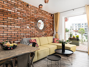 Apartament 41 metrów z przeznaczeniem pod wynajem - Średni biały salon z jadalnią z tarasem / balkonem, styl industrialny - zdjęcie od Apartments M&M- obsługa i aranżacja nieruchomości