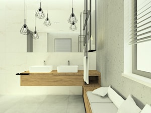 Łazienka z dodatkami drewna i stalowymi konstrukcjami.