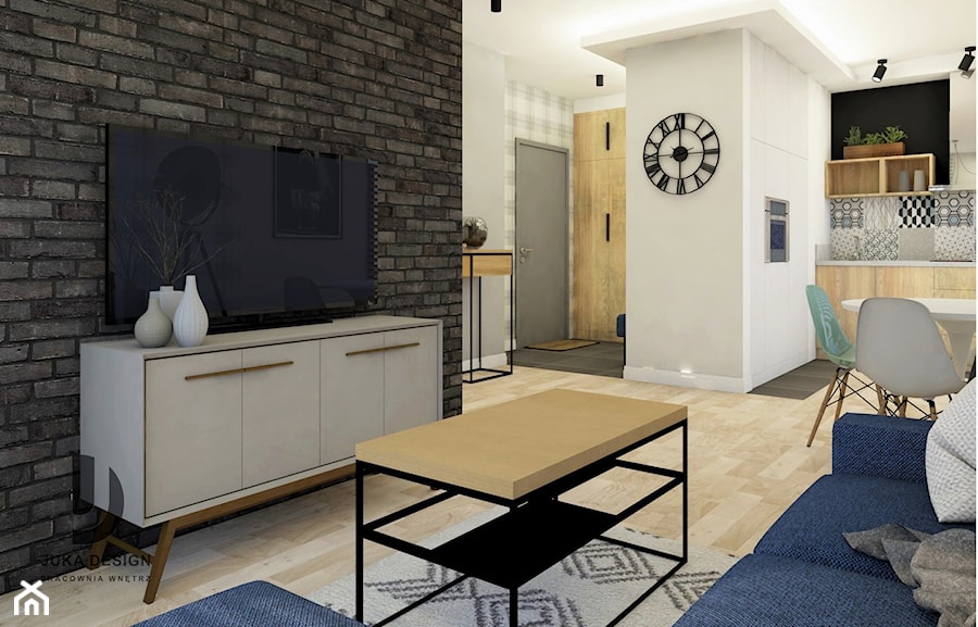 salon z aneksem kuchennym z czarną cegłą w stylu loft - zdjęcie od JUKA design Pracownia Wnętrz