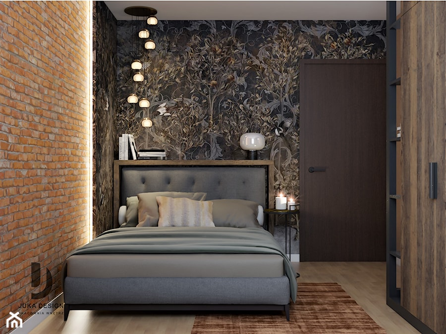 klimatyczna sypialnia z dużą szafą, cegłą i tapetą - zdjęcie od JUKA design Pracownia Wnętrz