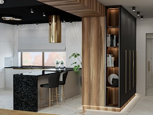 elegancka biała kuchnia z drewnem i złotym okapem - zdjęcie od JUKA design Pracownia Wnętrz