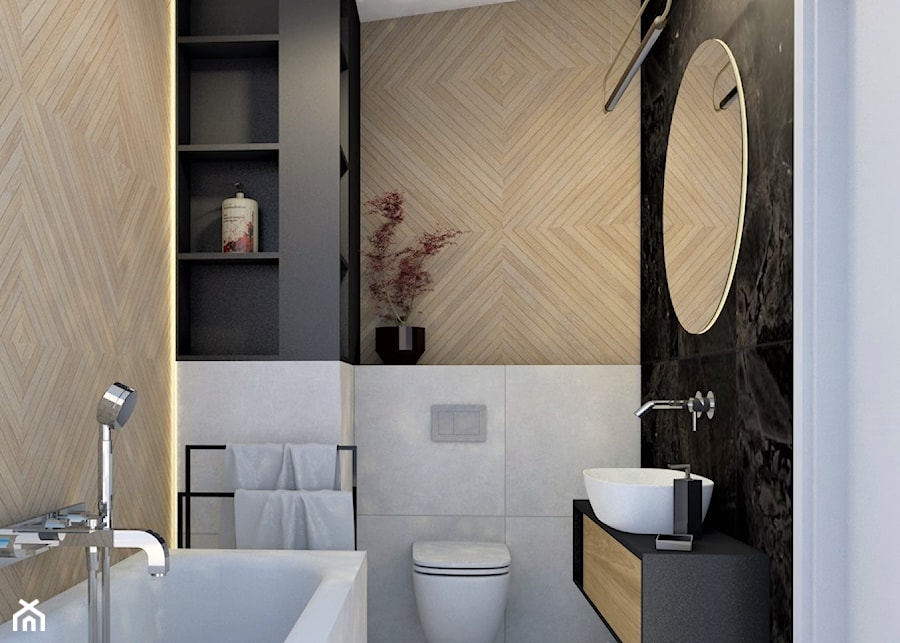 średnia łazienka z szarymi, czarnymi, drewnopodobnymi płytkami i dużym okrągłym lustrem - zdjęcie od JUKA design Pracownia Wnętrz