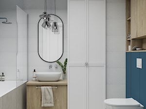 mała klasyczna łazienka z białymi i granatowymi płytkami - zdjęcie od JUKA design Pracownia Wnętrz