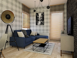 salon z narożnikiem, tapetą i czarną cegłą - zdjęcie od JUKA design Pracownia Wnętrz