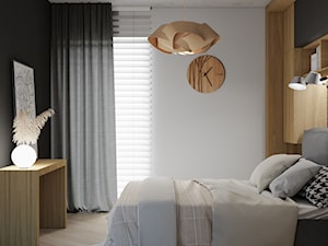 sypialnia z czarną ścianą - zdjęcie od JUKA design Pracownia Wnętrz